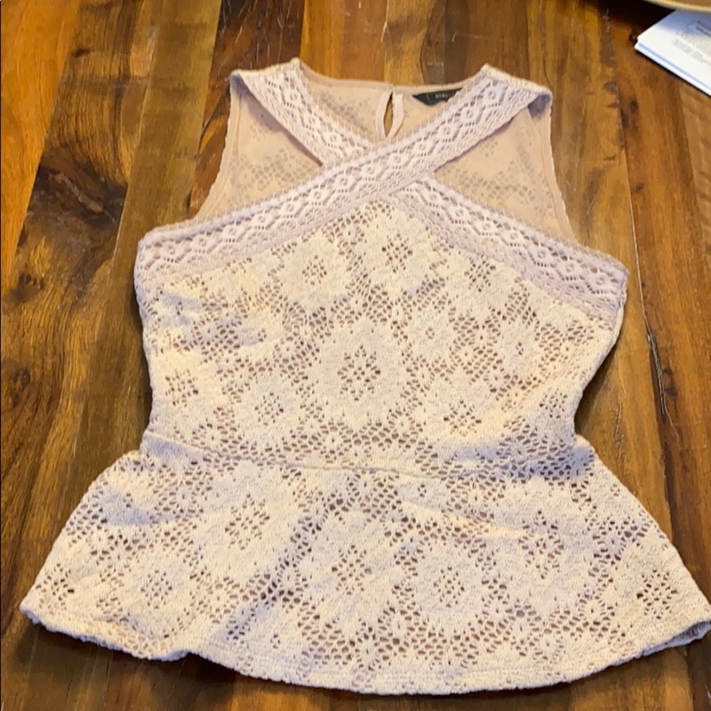 Lady’s beige peplum shirt